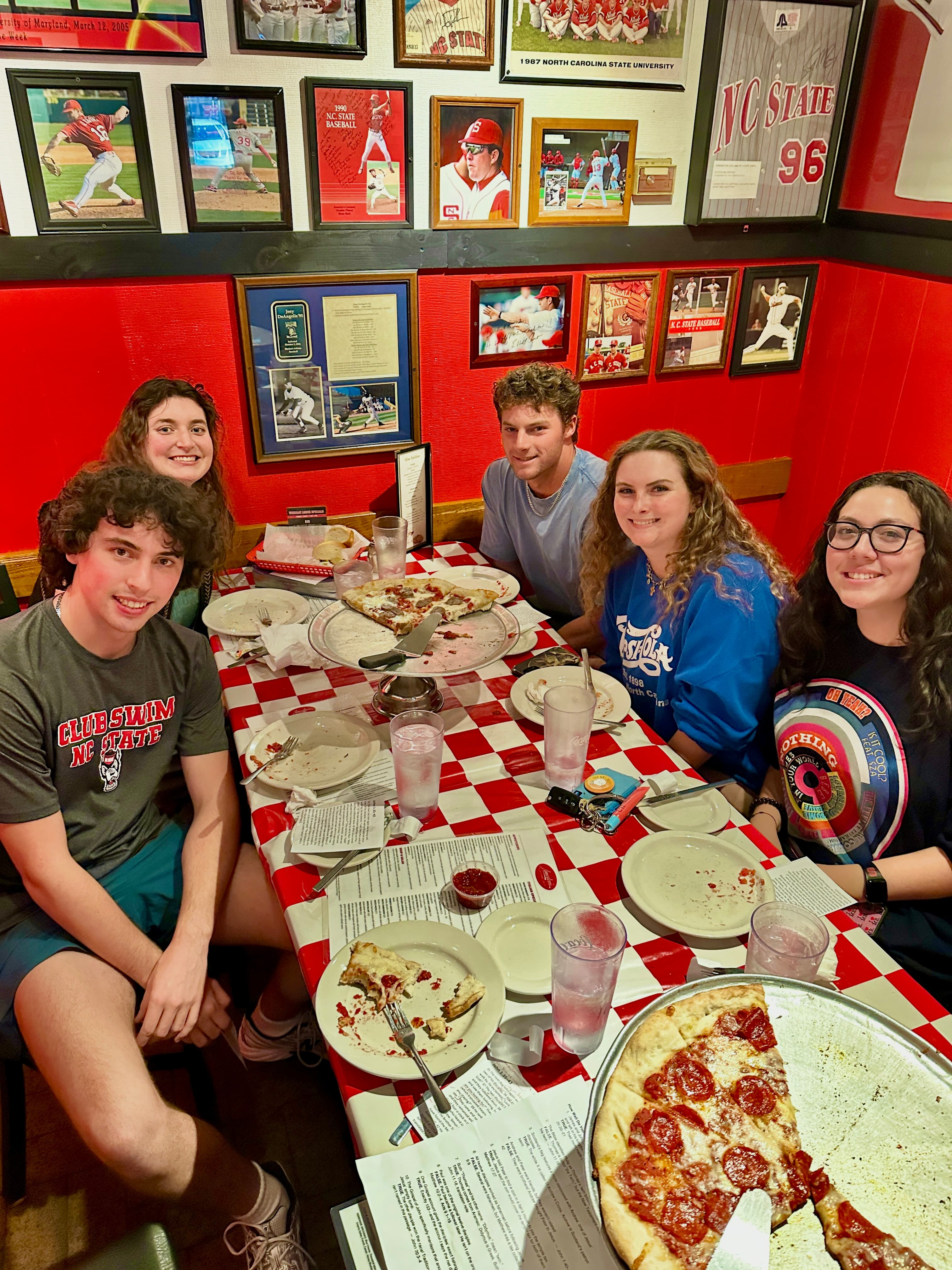 CrossPath young adults sharing a meal at Amedeo’s