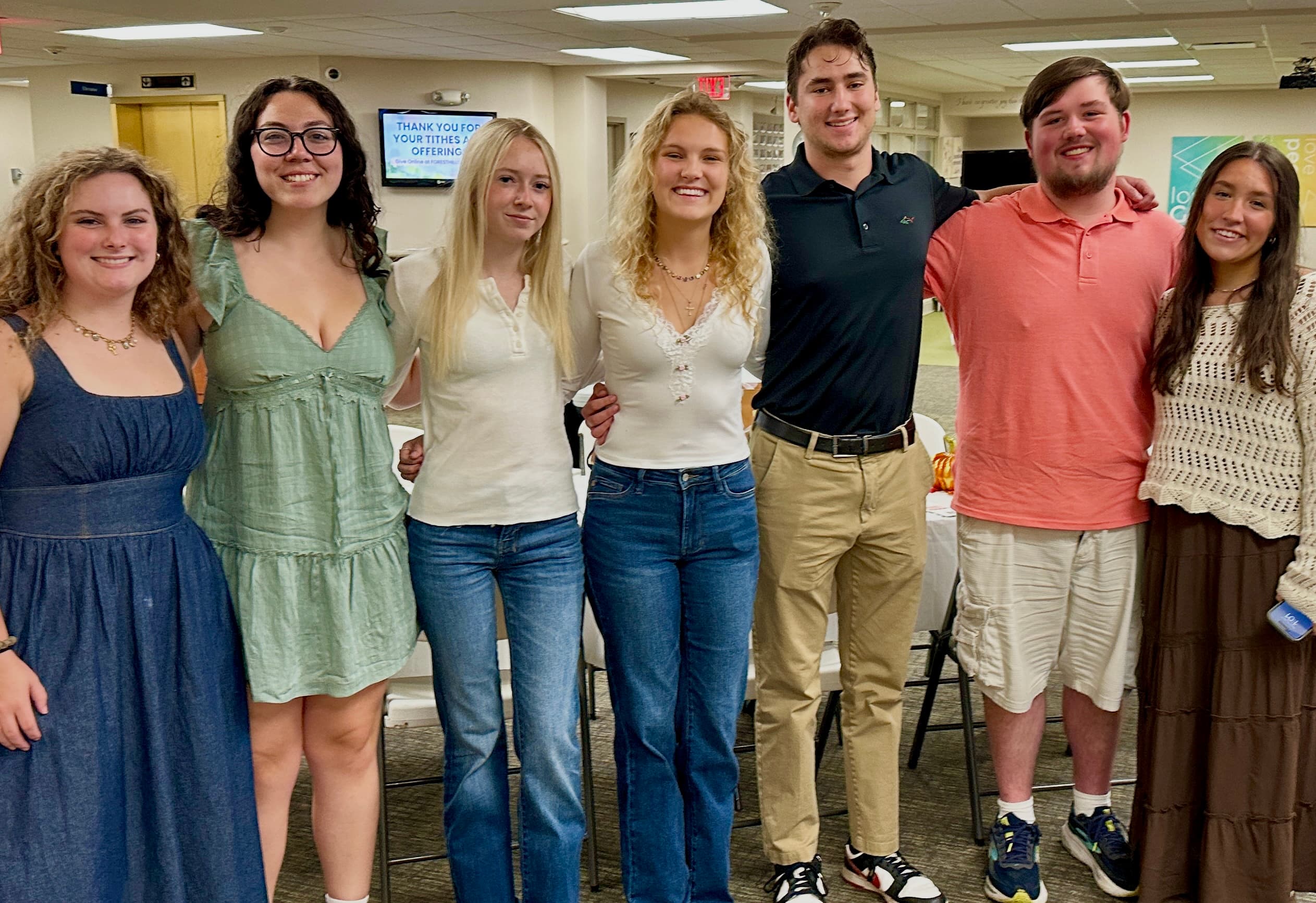 Young adults gathered together at Forest Hills Baptist Church